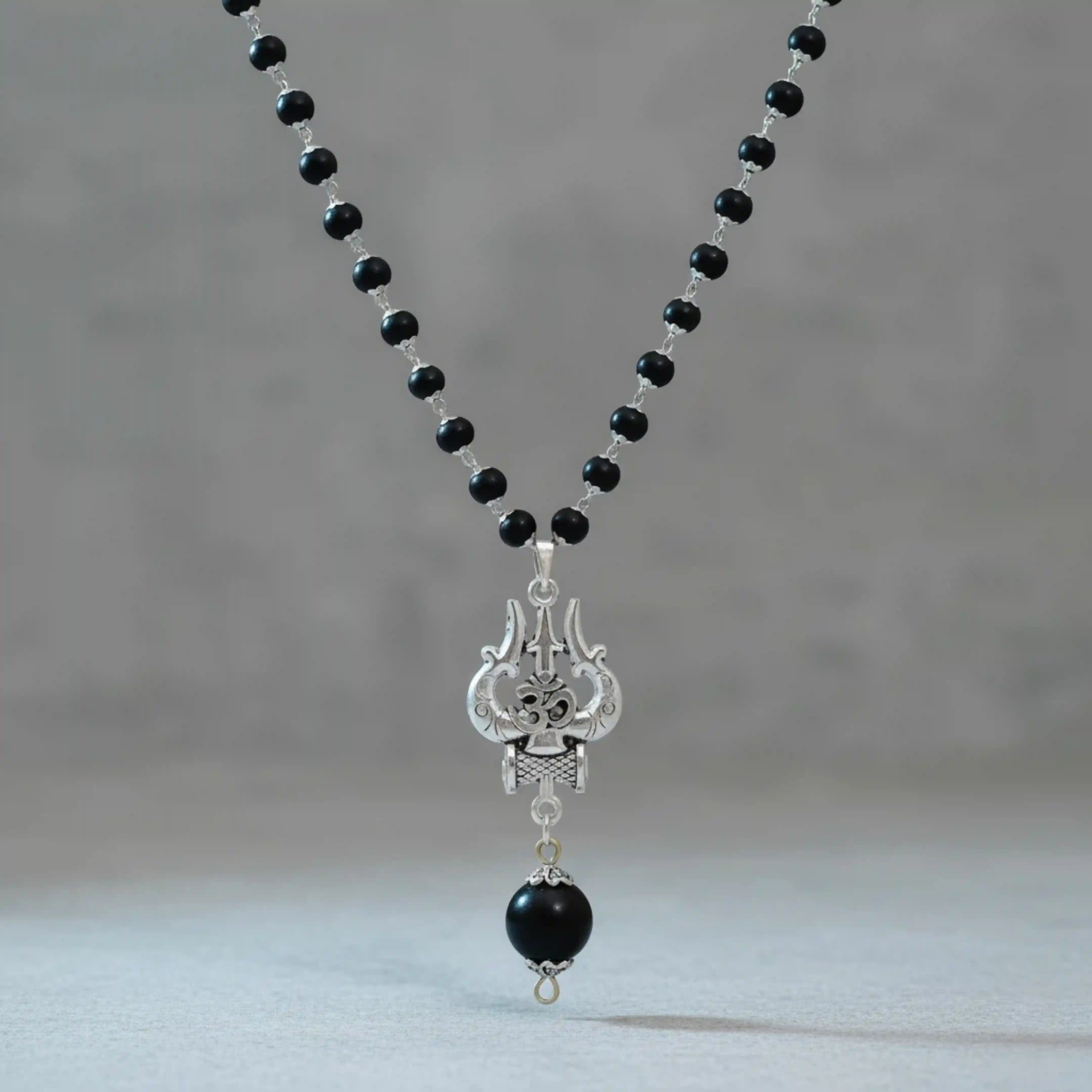 Silver Capped Karungali Malai - Om Trishul Pendant